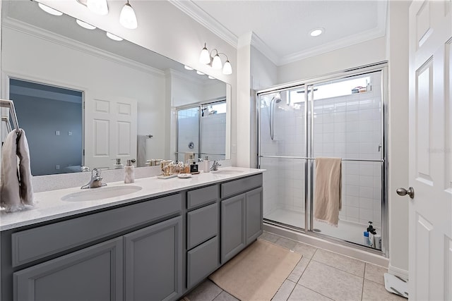 bathroom featuring tile patterned floors, vanity, walk in shower, and ornamental molding