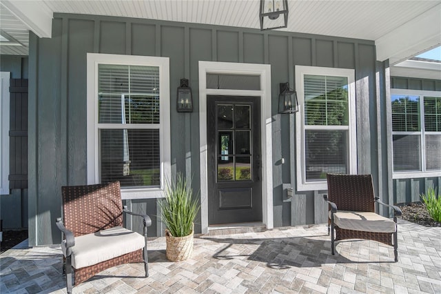 doorway to property with a porch