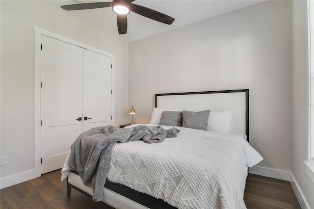 bedroom featuring a closet, ceiling fan, and dark hardwood / wood-style floors