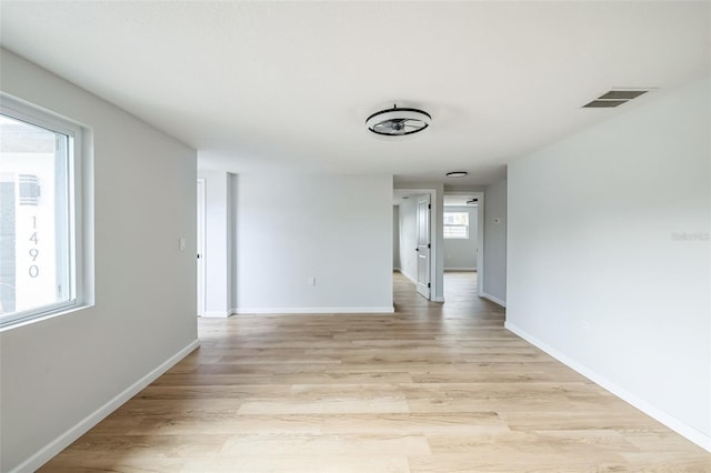 empty room featuring light hardwood / wood-style floors