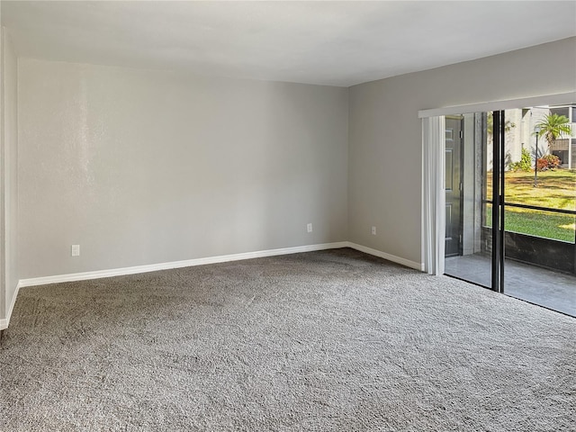 unfurnished room with carpet floors