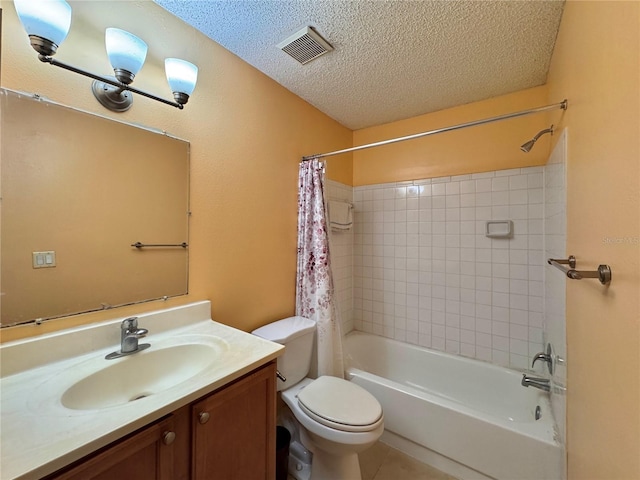 full bathroom with vanity, tile patterned floors, toilet, a textured ceiling, and shower / tub combo with curtain