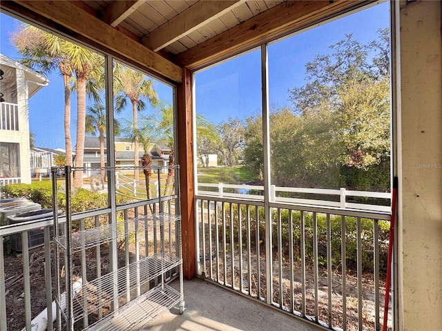 unfurnished sunroom with a wealth of natural light