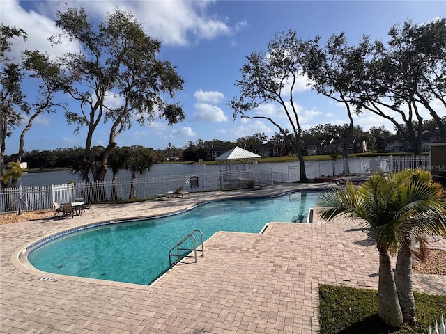 view of swimming pool featuring a patio area