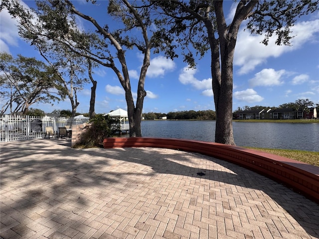 view of patio / terrace with a water view