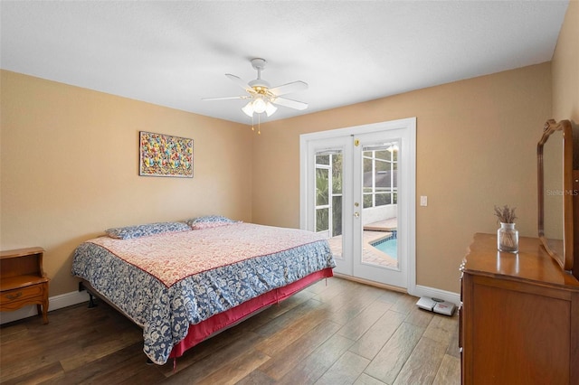 bedroom featuring access to exterior, ceiling fan, french doors, and dark hardwood / wood-style floors