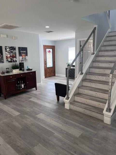 entrance foyer with hardwood / wood-style floors