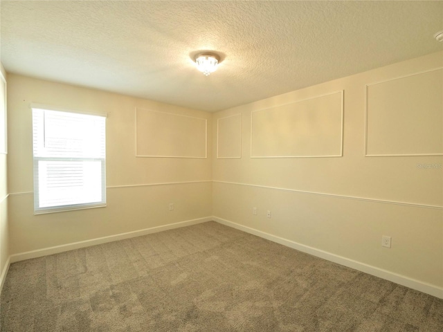 empty room featuring carpet floors