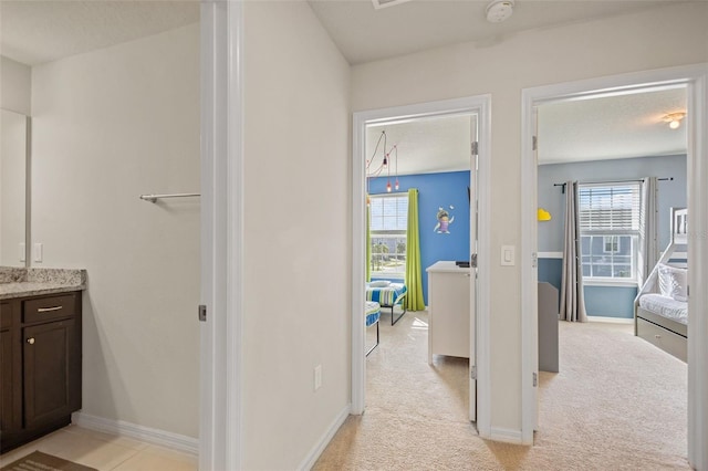 bathroom featuring vanity and a textured ceiling