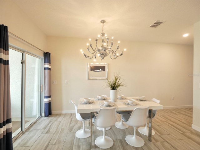 dining room featuring an inviting chandelier