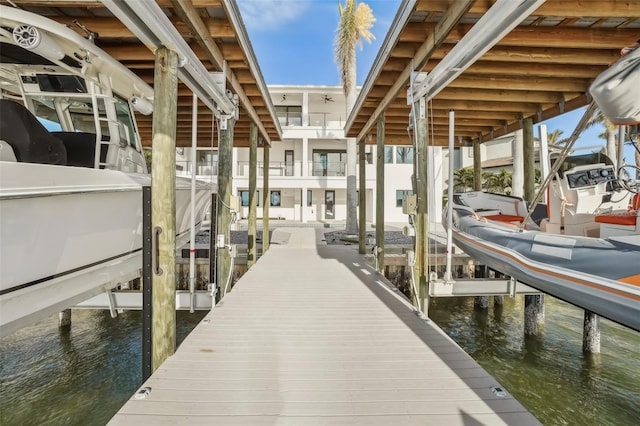 dock area with a water view