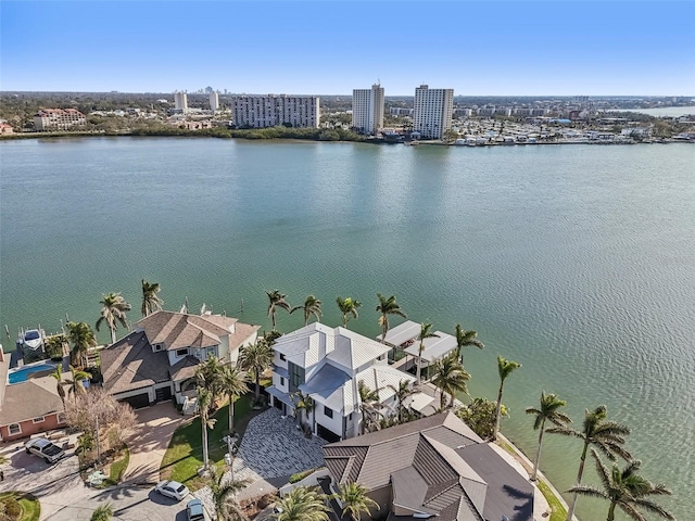 bird's eye view with a water view