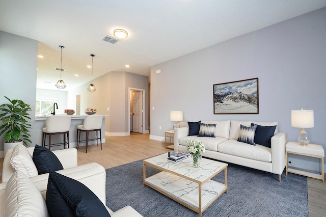 living room with hardwood / wood-style flooring