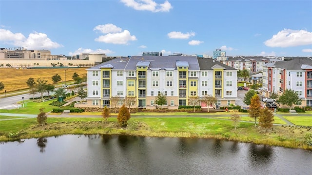 view of property with a water view