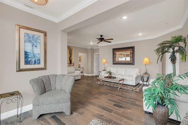 living room with crown molding and ceiling fan