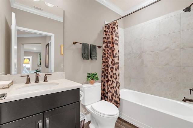 full bathroom featuring hardwood / wood-style floors, toilet, shower / bathtub combination with curtain, and crown molding