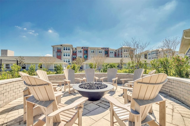 view of patio / terrace featuring a fire pit