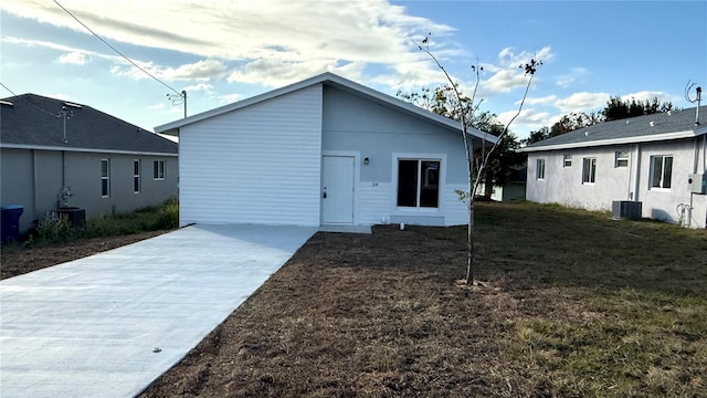 back of property with cooling unit