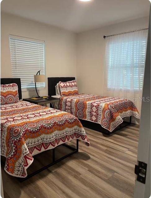 bedroom featuring hardwood / wood-style floors