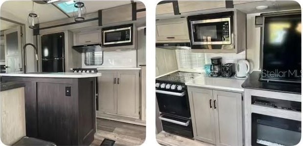 kitchen featuring stainless steel microwave, ventilation hood, sink, decorative backsplash, and wood-type flooring