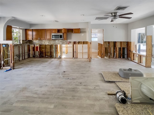 miscellaneous room featuring ceiling fan