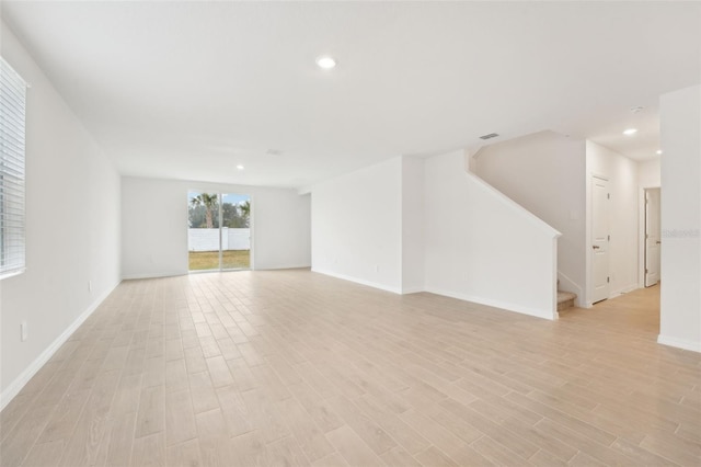 unfurnished room featuring light hardwood / wood-style flooring