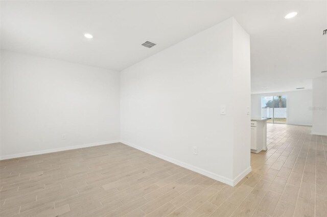 empty room featuring light hardwood / wood-style floors