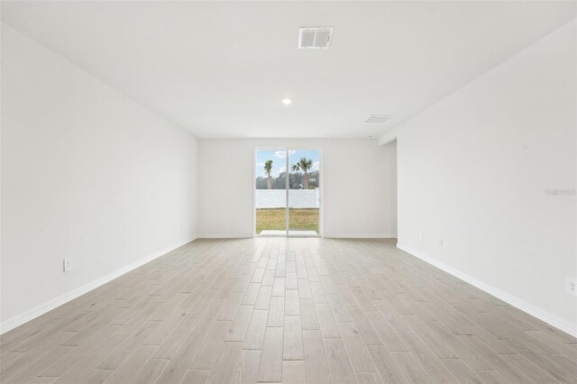 empty room featuring light hardwood / wood-style floors