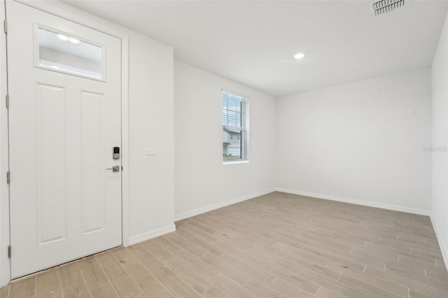 foyer entrance featuring light hardwood / wood-style floors