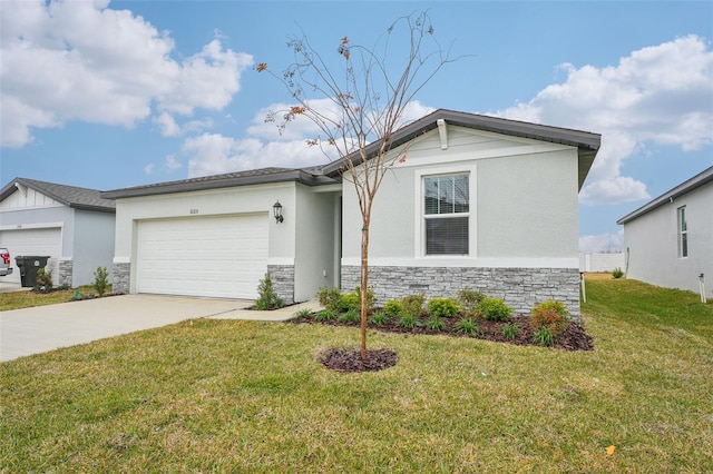 view of front of house featuring a garage and a front yard