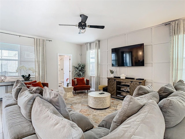 living room featuring ceiling fan