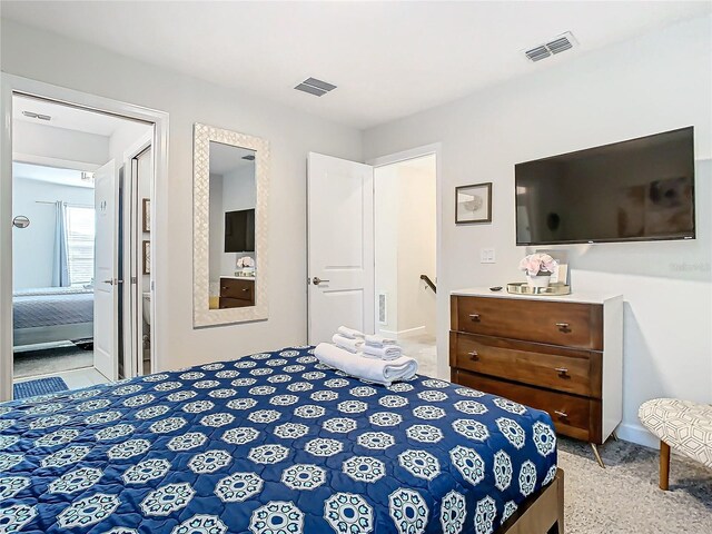 bedroom with connected bathroom