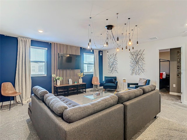 living room featuring an inviting chandelier