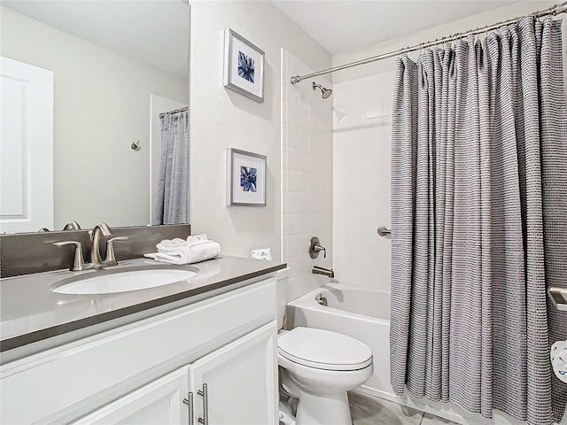 full bathroom with toilet, vanity, and shower / bath combo with shower curtain