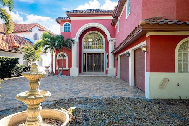 property entrance featuring a garage