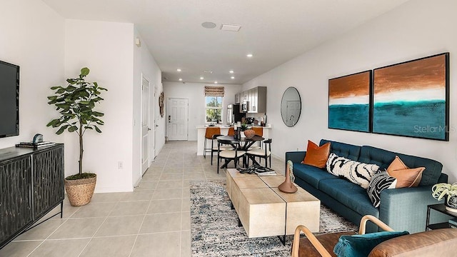 living room featuring light tile patterned floors