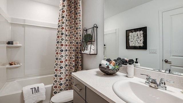 full bathroom with vanity, toilet, and shower / tub combo with curtain