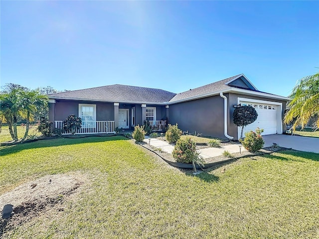 ranch-style house featuring a porch, a garage, and a front lawn