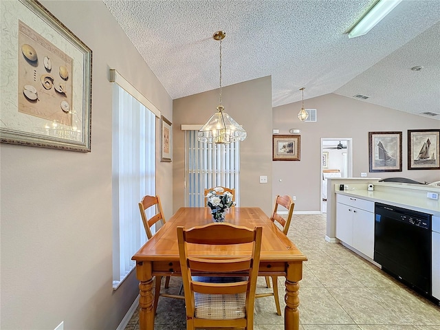 dining area with ceiling fan with notable chandelier, light tile patterned flooring, lofted ceiling, and a textured ceiling