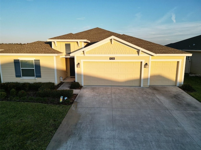 view of front of property featuring a garage