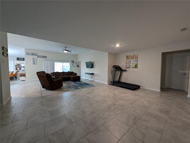 living room featuring ceiling fan