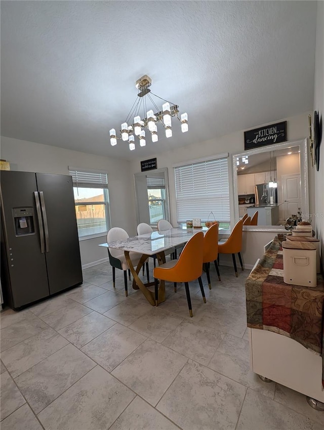 dining room featuring an inviting chandelier