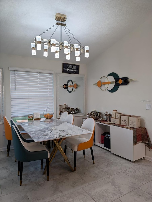 dining room featuring an inviting chandelier