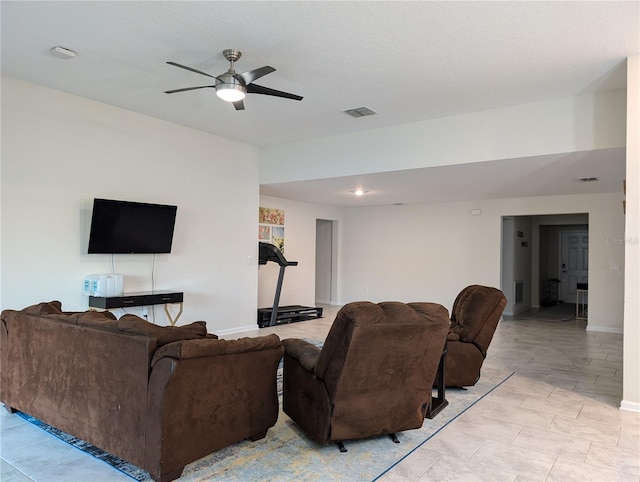 living room with ceiling fan