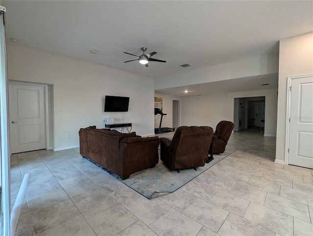 living room featuring ceiling fan