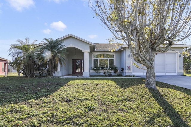 single story home with a garage and a front yard