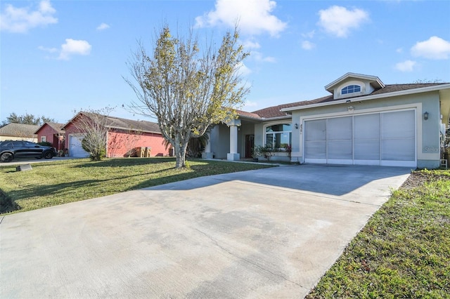 single story home featuring a front yard and a garage