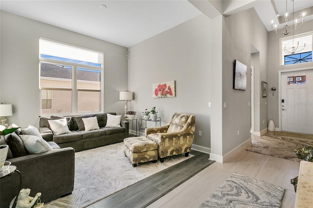 living room featuring a chandelier