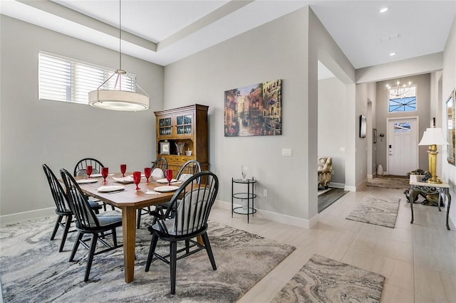 dining space featuring a chandelier