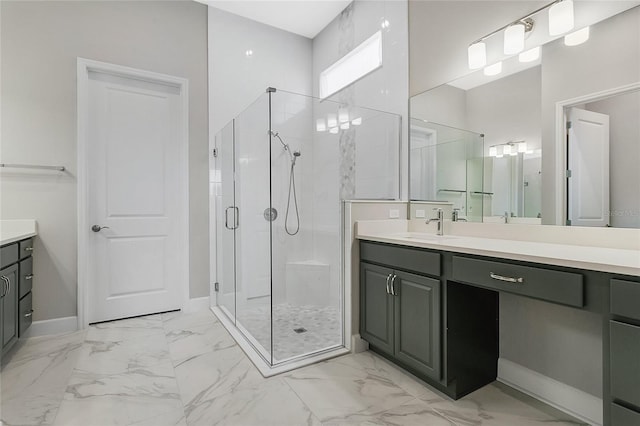 bathroom featuring vanity and an enclosed shower